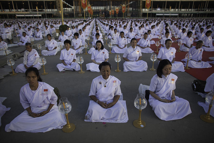 Thai Women Pray for Peace Photograph by David Longstreath
