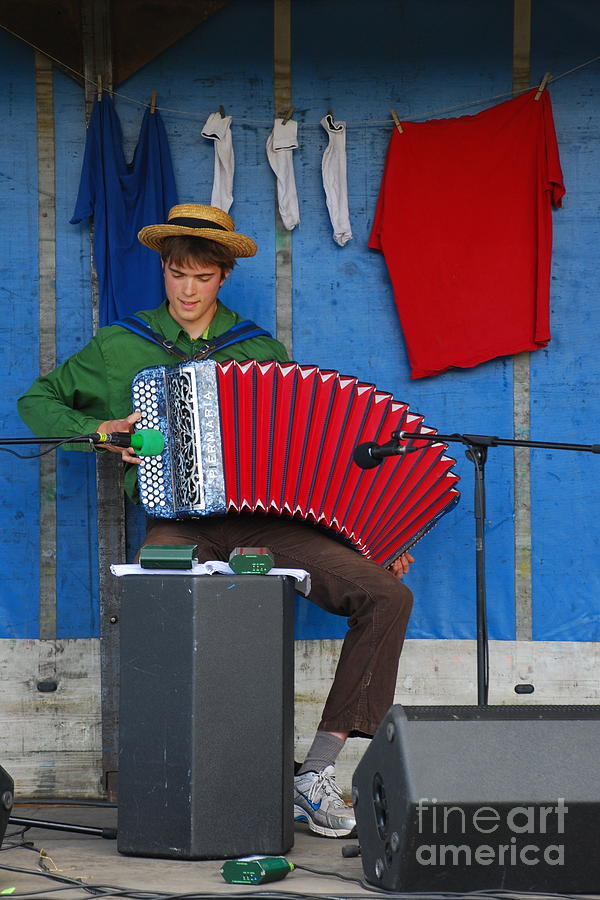 The accordion Player Photograph by Joe Cashin