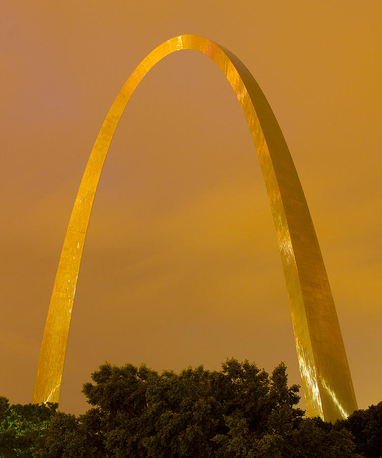 The Arch in the glow of St Louis city lights at night Photograph by Garry McMichael