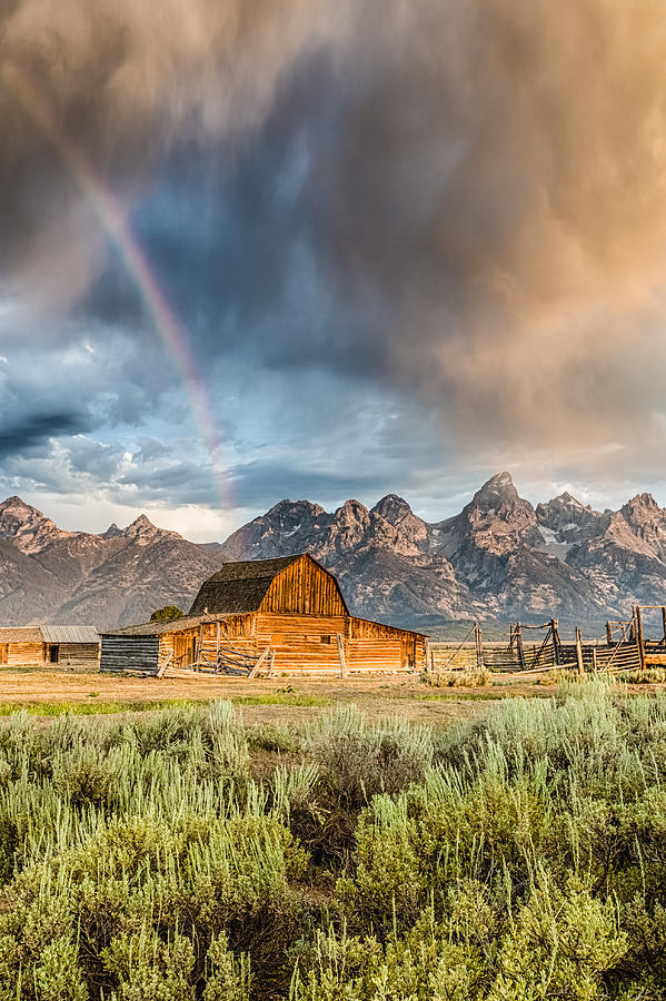 Grand Teton National Park Photograph - The Barn at the end of the Rainbow by Andres Leon