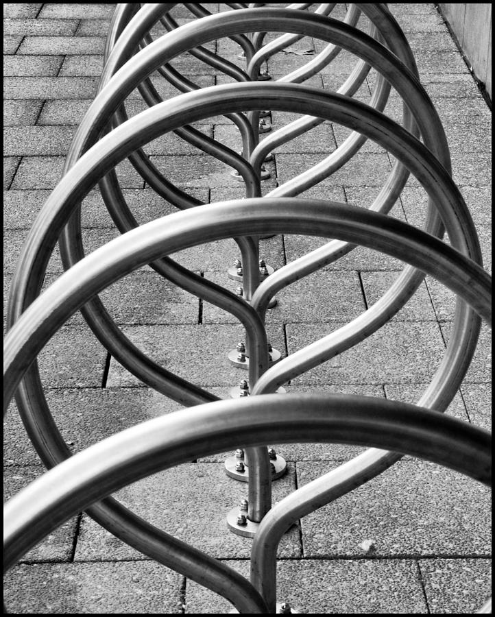The Bicycle Rack Photograph by Geraldine Alexander