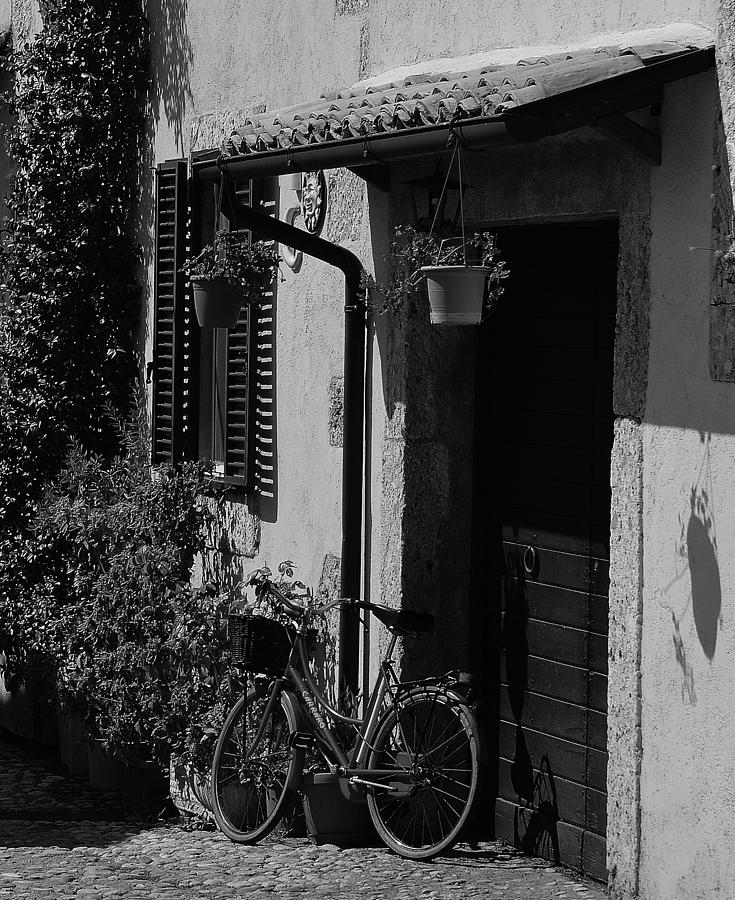 Bicycle Photograph - The Bicycle under the Porch by Dany Lison