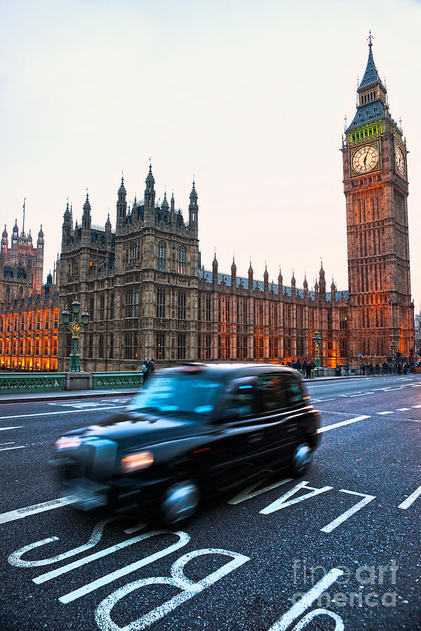 The Big Ben with moving taxi - London Photograph by Luciano Mortula