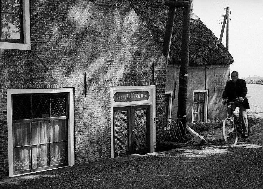 The Bike Rider Photograph by Cornelis Verwaal