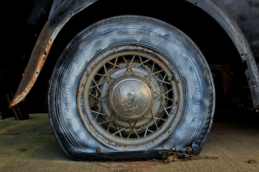 The Blue Tire Photograph by Tom and Pat Cory