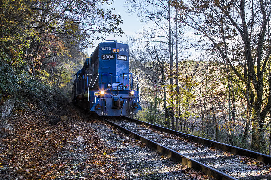 The Blue Train Photograph by Debra and Dave Vanderlaan