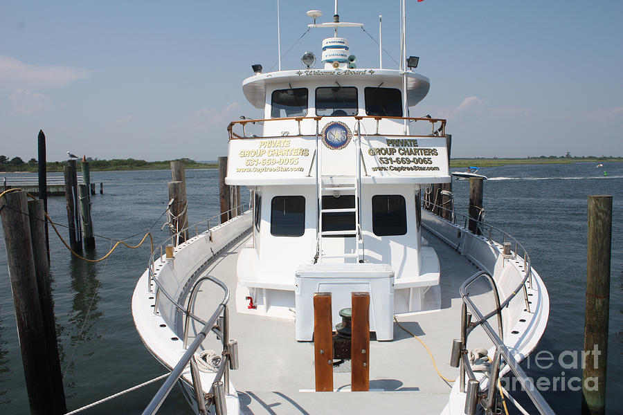 The Bow of the Captree Star Docked at Captree State Park Photograph by John Telfer