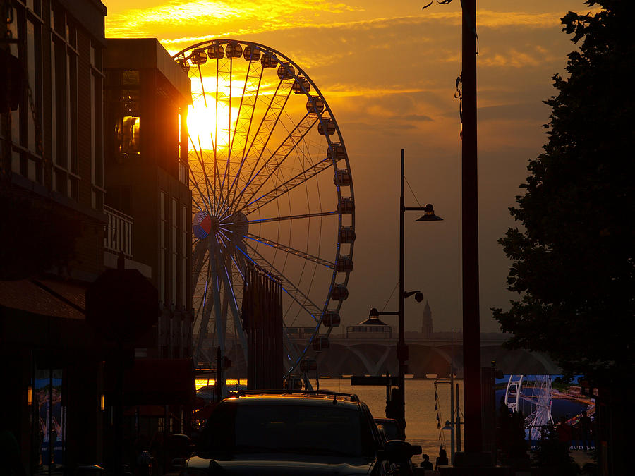 Sunset Photograph - The Capital Wheel in National Harbor by James Granberry