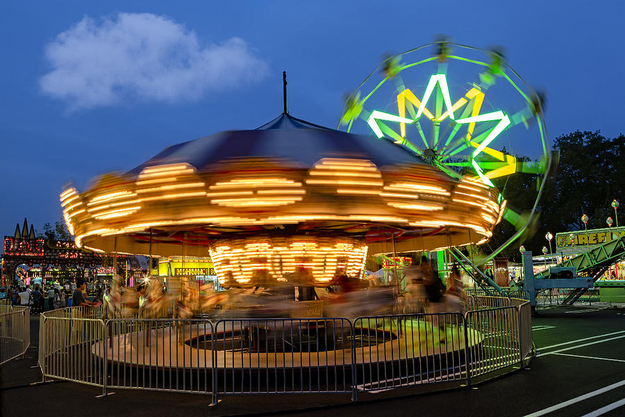 Ferris Wheel Photograph - The Carnival Is In Town by Susan Candelario