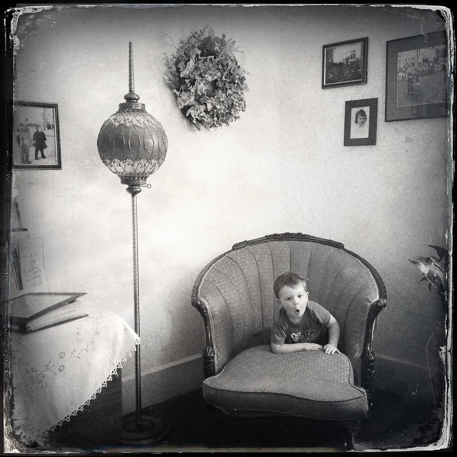 Black And White Photograph - The Chair Eats the Child by Natasha Marco