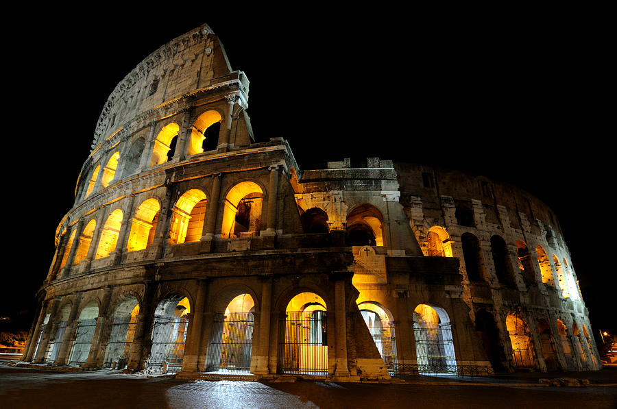 The Colosseum at night Photograph by Jeremy Voisey