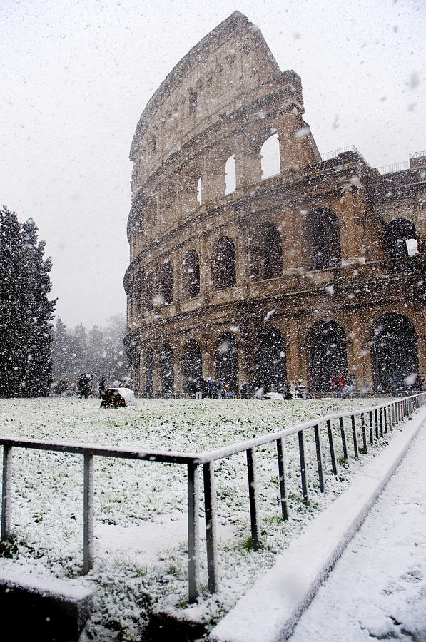 The Colosseum under heavy snow Photograph by Fabrizio Troiani