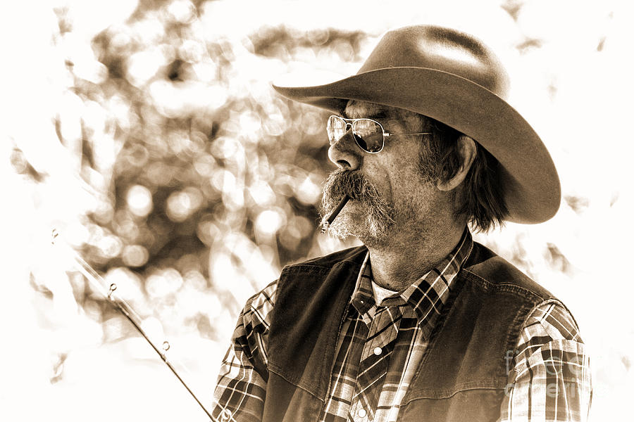 Angler Photograph - The Cowboy Angler by Jim Garrison