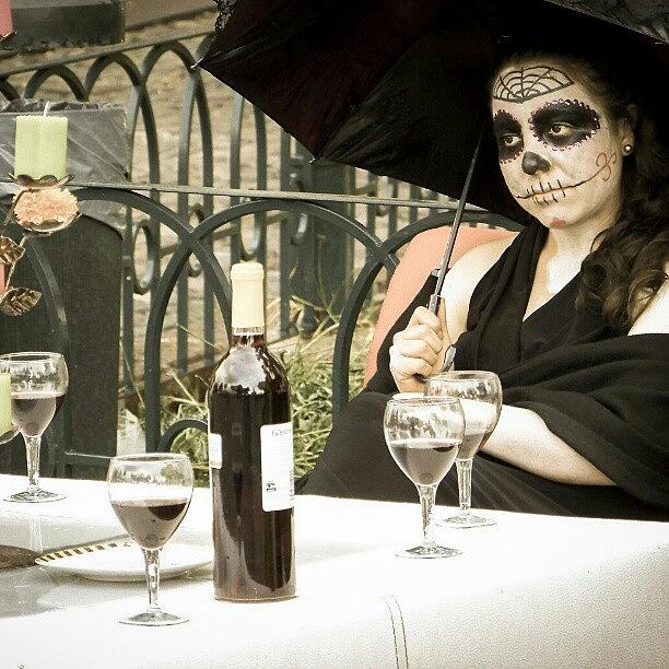 Cute Photograph - The  Death Drinks Wine At  Your Table by Miguel Alvarado