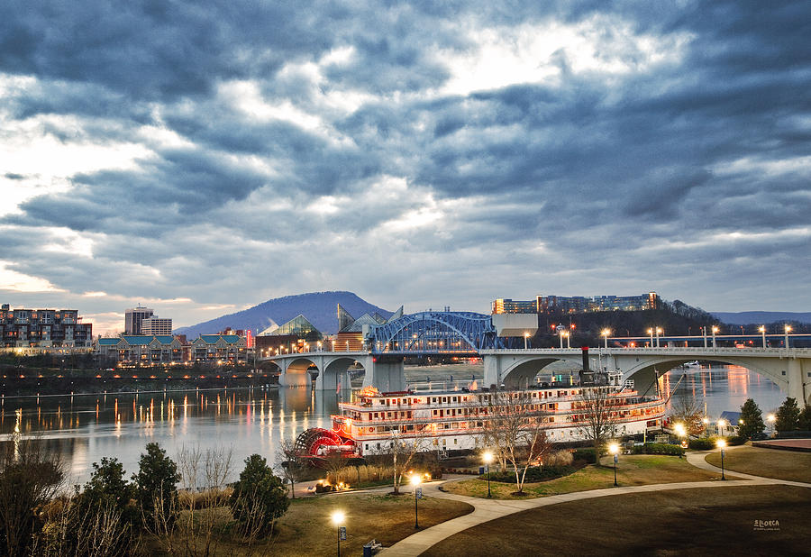 The Delta Queen and Coolidge Park At Dusk Photograph by Steven Llorca