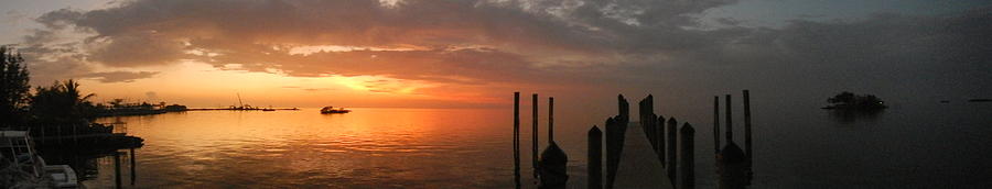 Sunset Photograph - The Dock by Susan Sidorski