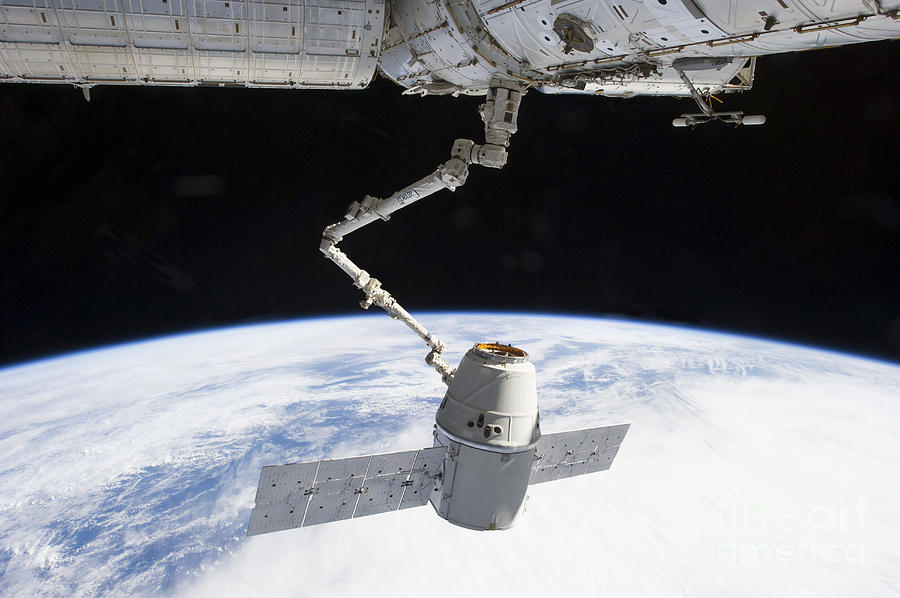 The Docking Of Spacex Dragon Photograph by Stocktrek Images