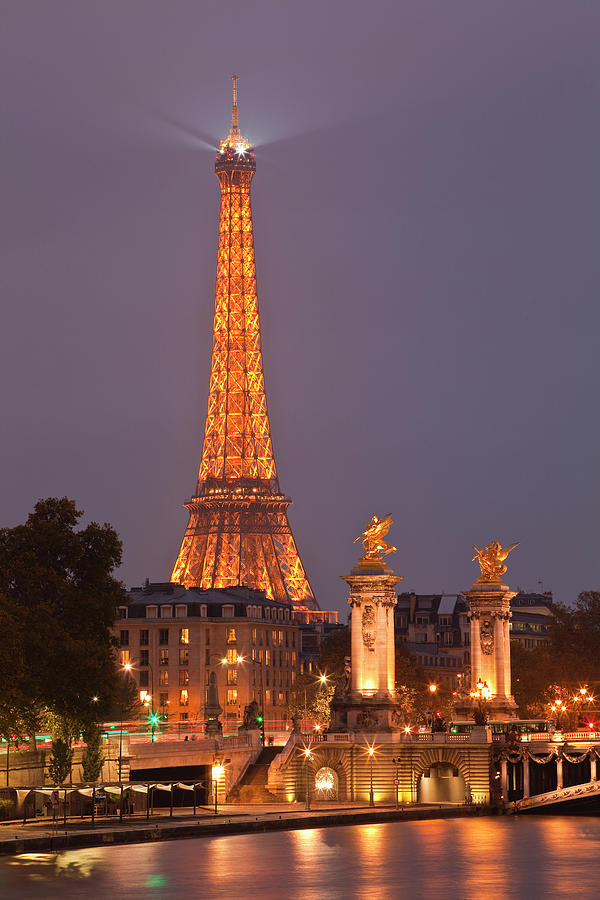The Eiffel Tower Lit Up At Night Photograph by Julian Elliott Photography