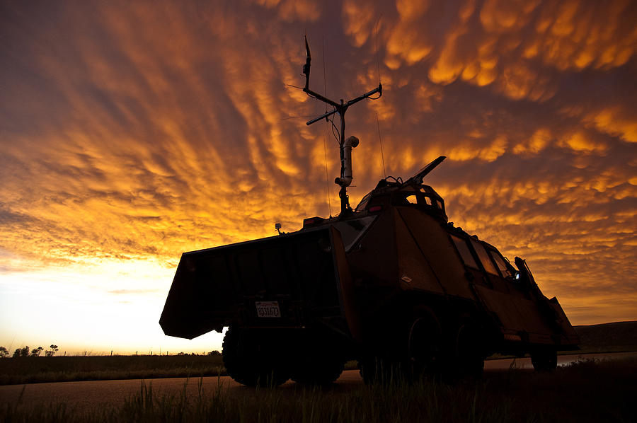 Sunset Photograph - The End to a Day of Chasing Storms by Brandon  Ivey