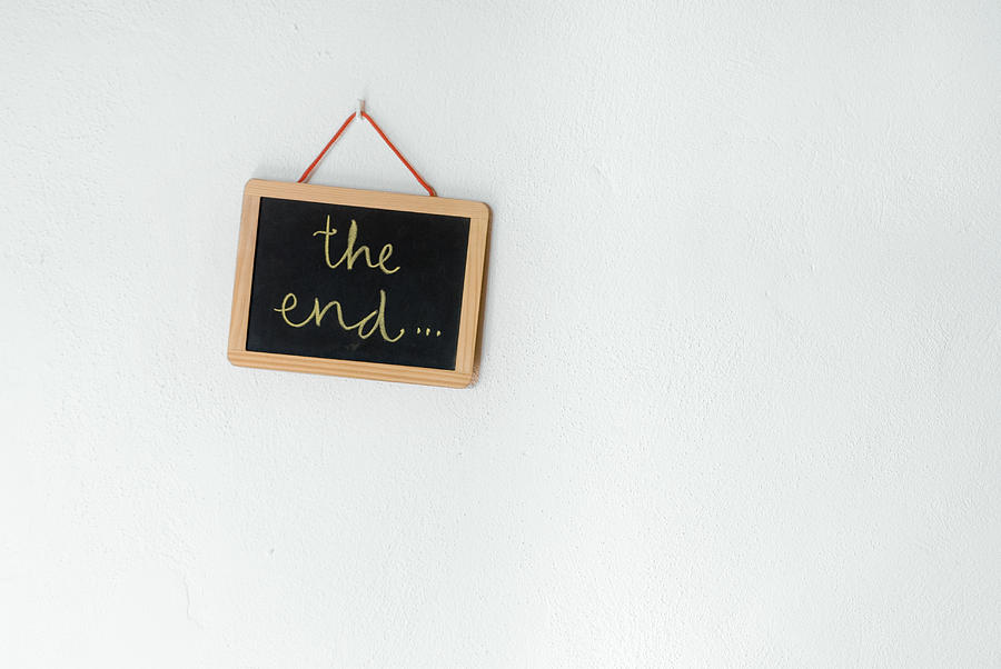 The end written on slate which is hanging on wall Photograph by Argider Aparicio San Felices