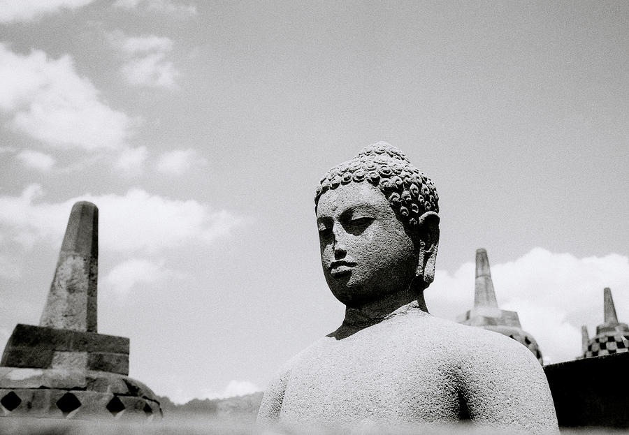 The Ethereal Buddha Of Borobudur Photograph by Shaun Higson
