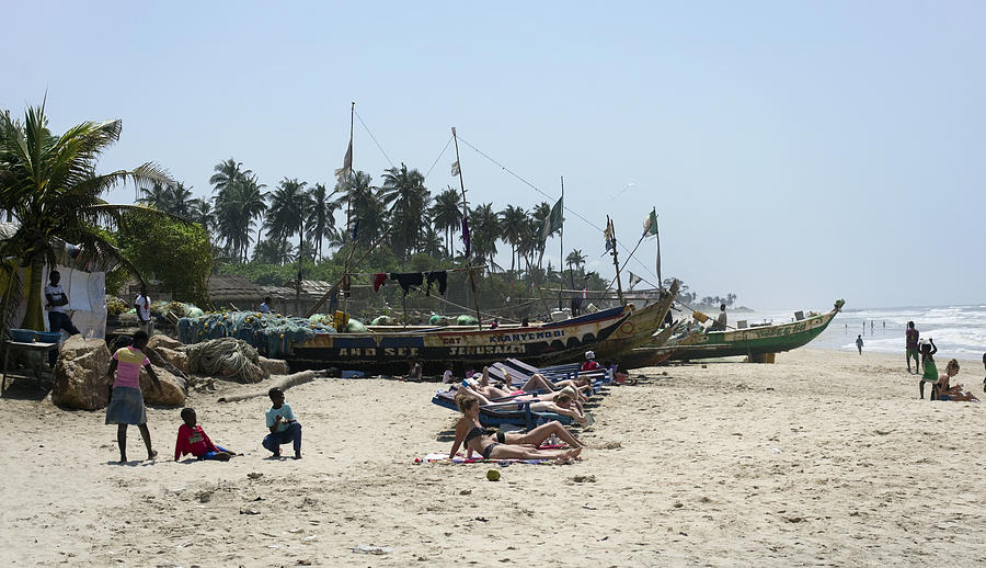 The European Tourists Have A Rest On The African Sea Coast Photograph 