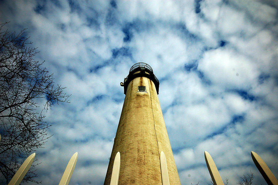 The Fenwick Light and a Mackerel Sky Photograph by Bill Swartwout