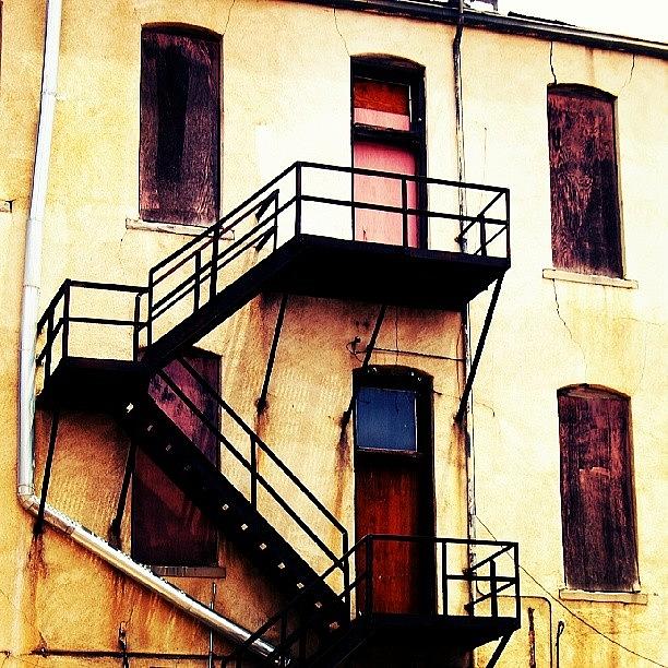 Building Photograph - The Fire Escape by Niki Crawford