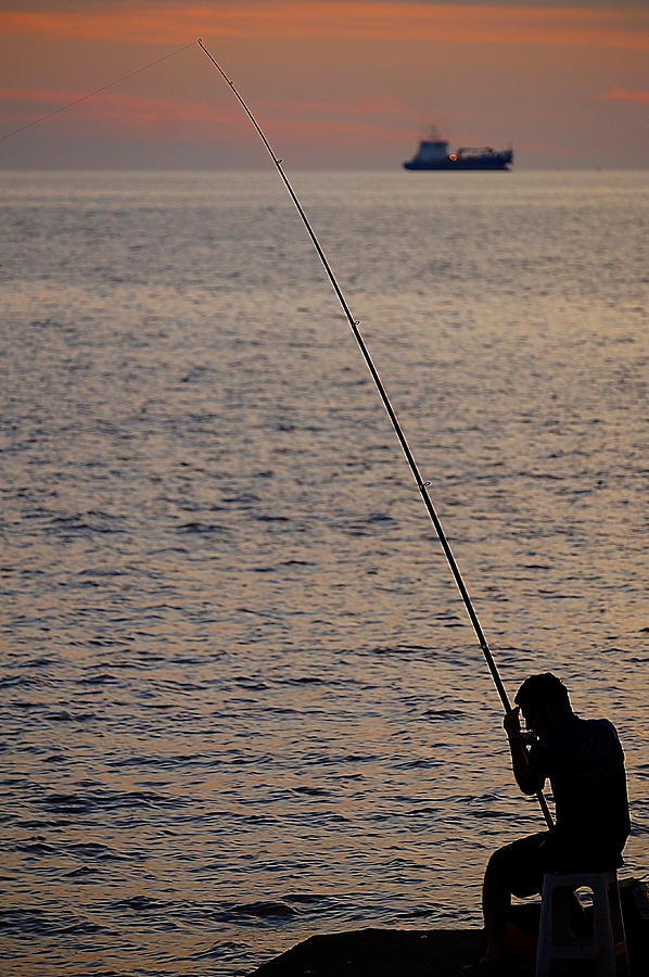 The Fisherman Photograph by Blair Wainman