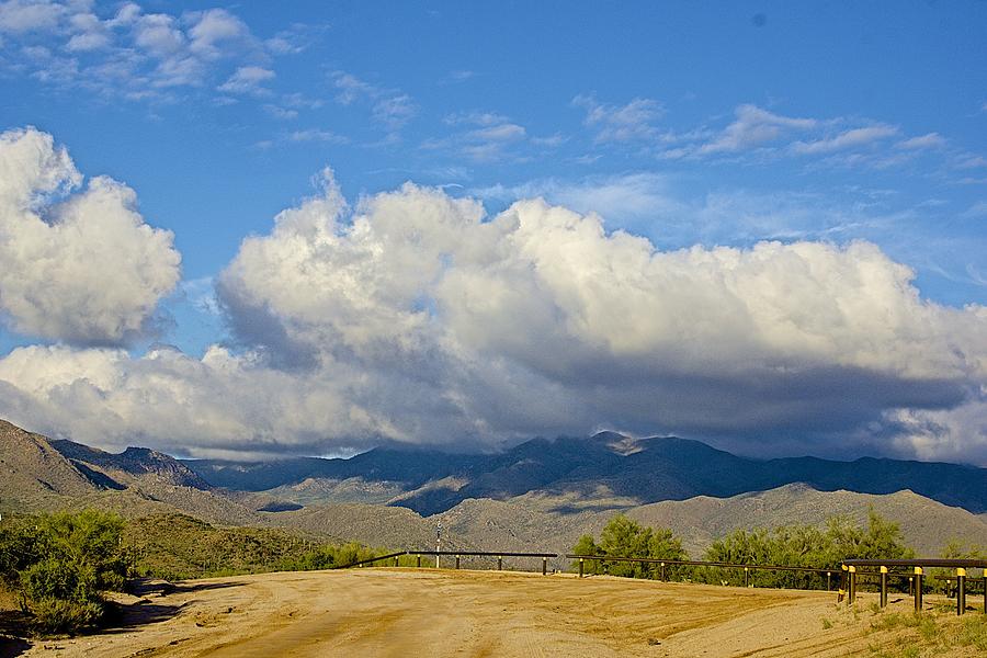 The Four Peaks behind Clouds Photograph by Barbara Zahno