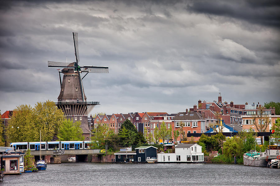 The Gooyer Windmill in the City of Amsterdam Photograph by Artur Bogacki