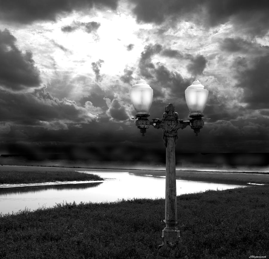 Surrealism Photograph - The Guiding Light by Larry Butterworth