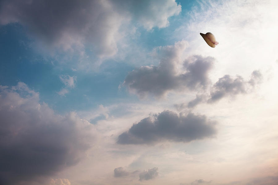 The Hat Flying In The Sky Photograph by Hiroshi Watanabe