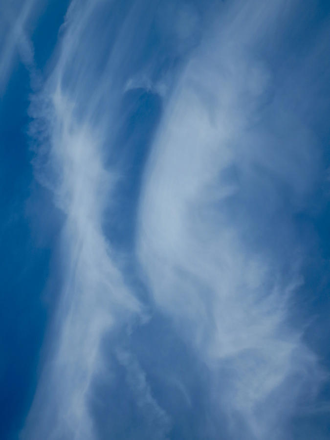 The Kissing clouds Photograph by David Pyatt