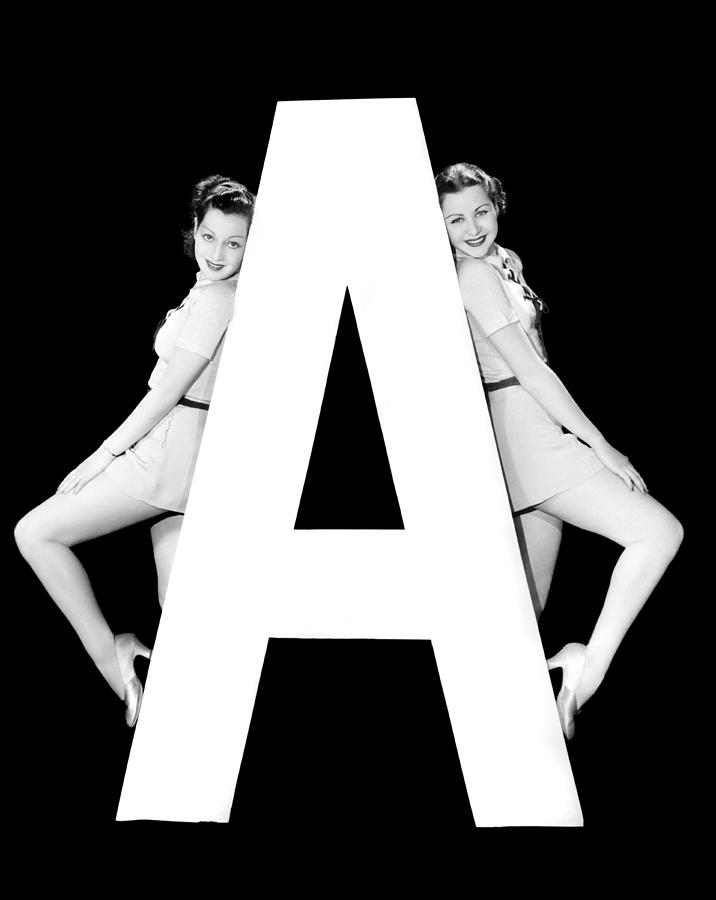 The Letter A And Two Women Photograph by Underwood Archives