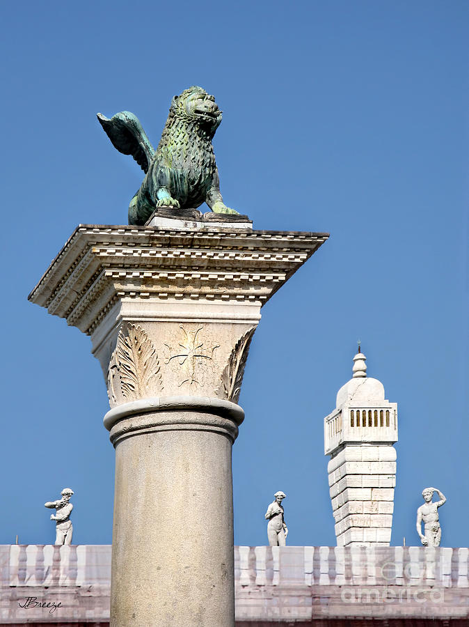 The Lion of St Mark at Piazzetta San Marco in Venice Photograph by Jennie Breeze