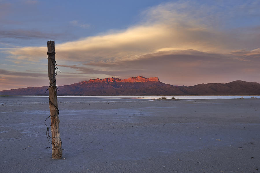 Sunset Photograph - The Lone Fence Post by Andrew Fritz