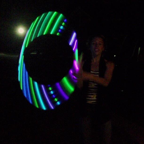 The Lovely Girl And Her Glowing Hoop Photograph by Margie P