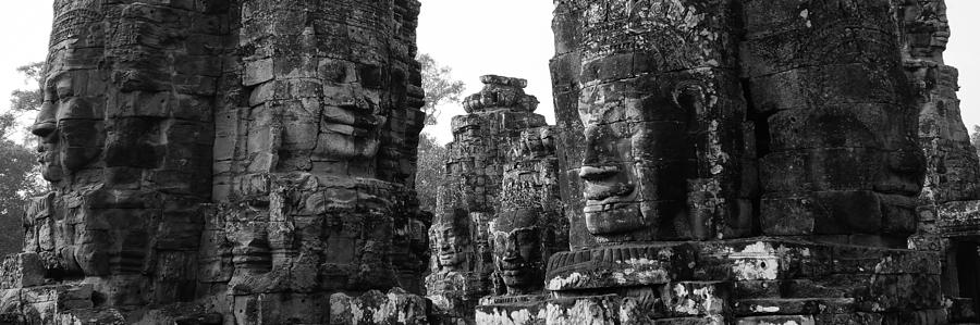 Buddha Photograph - The Many Faces of Bayon by Lauren Rathvon