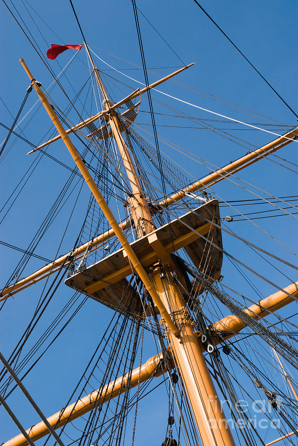 The mast of HMS Warrior in Portsmouth Harbour Photograph by Peter Noyce