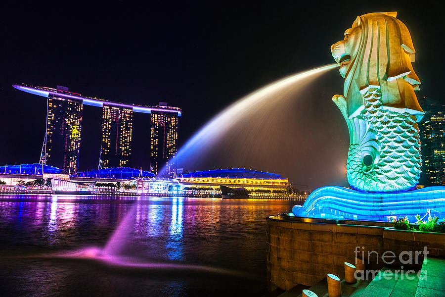 The Merlion fountain and Marina Bay Sands - Singapore Photograph by Luciano Mortula