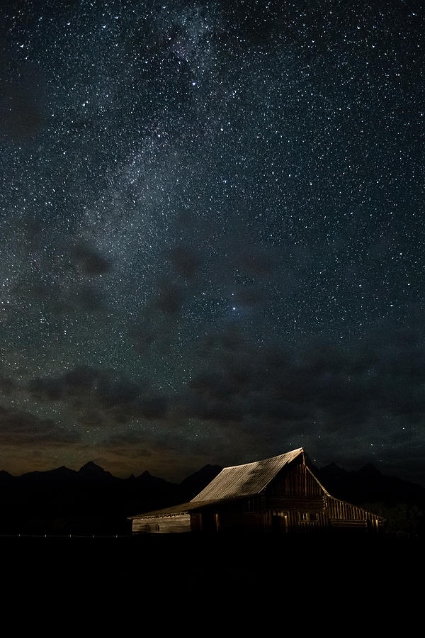 Interstellar Photograph - The milky way on Moulton Barn - Grand Teton National Park by Andres Leon
