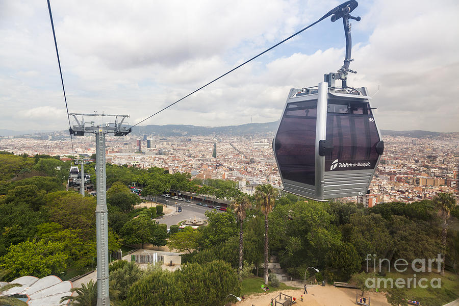 The Montjuic cable car with Barcelona Panorama Photograph by Peter Noyce