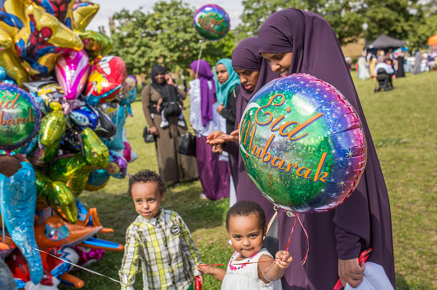 The Muslim Festival Of Eid al-Fitr Is Celebrated Around The UK Photograph by Rob Stothard The Muslim Festival Of Eid al-Fitr Is Celebrated Around The UK Photograph by Rob Stothard