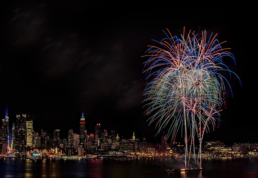 The New York City Skyline Sparkles Photograph by Susan Candelario