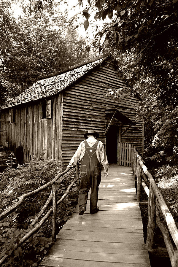 The old man at the mill Photograph by Daniel Woodrum