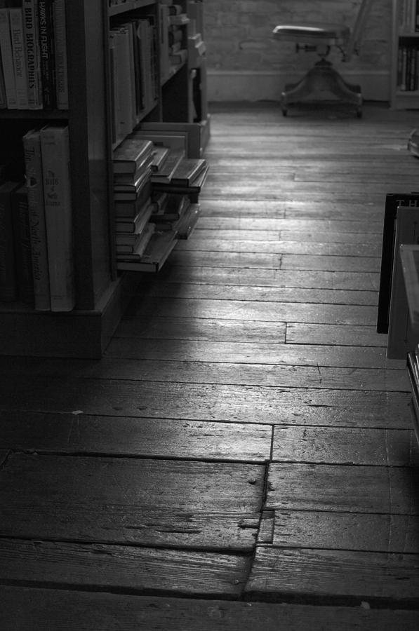Black And White Photograph - The Old Wood Floor In The Old Book Store - black and white by John Ayo