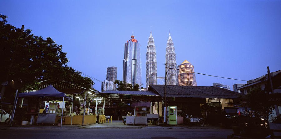 The Petronas Towers At Twilight Photograph by Shaun Higson