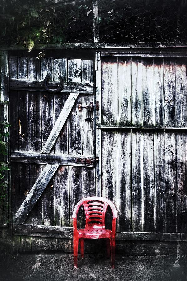Chair Photograph - The Red Plastic Chair by Christian Smit