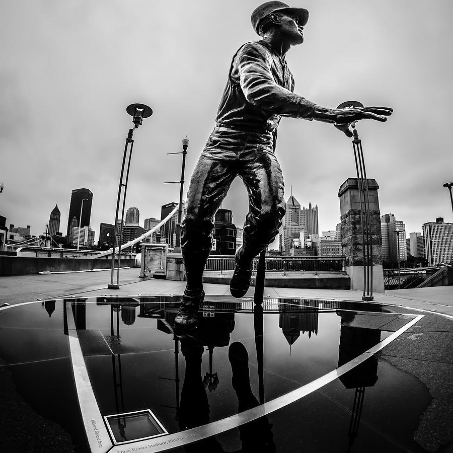 The Roberto Clemente statue stands just before the Roberto Cleme Photograph by Alex Grichenko